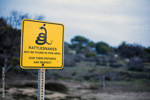 sign with a warning for rattlesnakes