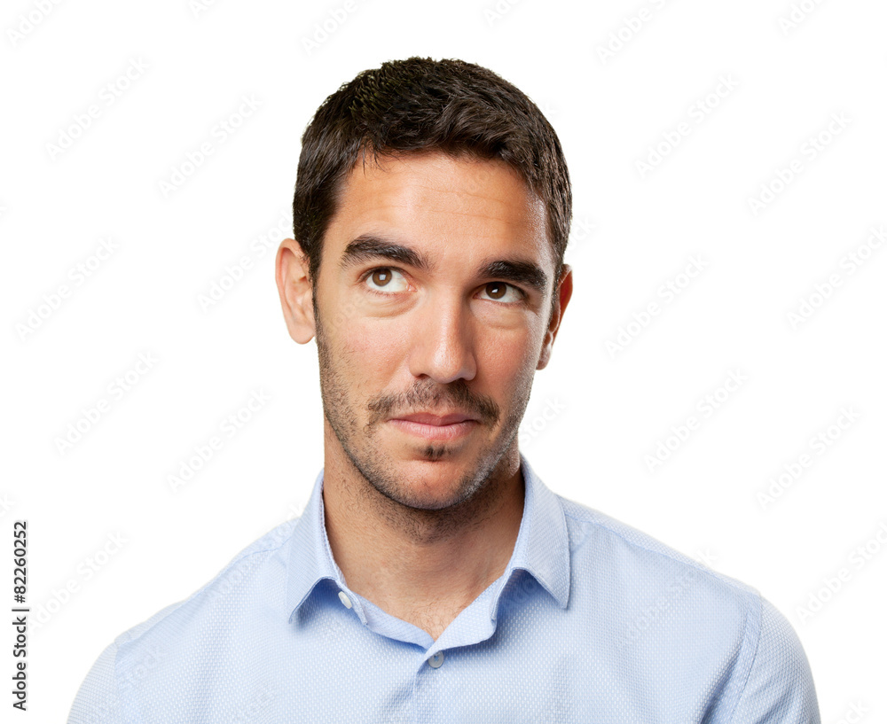 Close up of a young businessman wondering