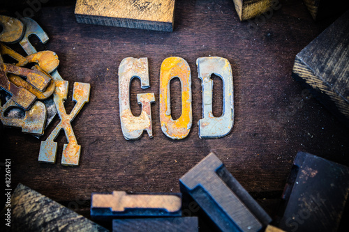 Photography God Concept Wood and Rusted Metal Letters