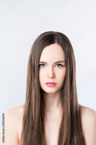 Brunette with long straight hair.
