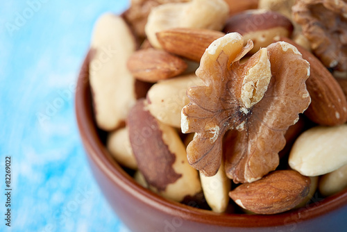 Mix nuts on wooden background