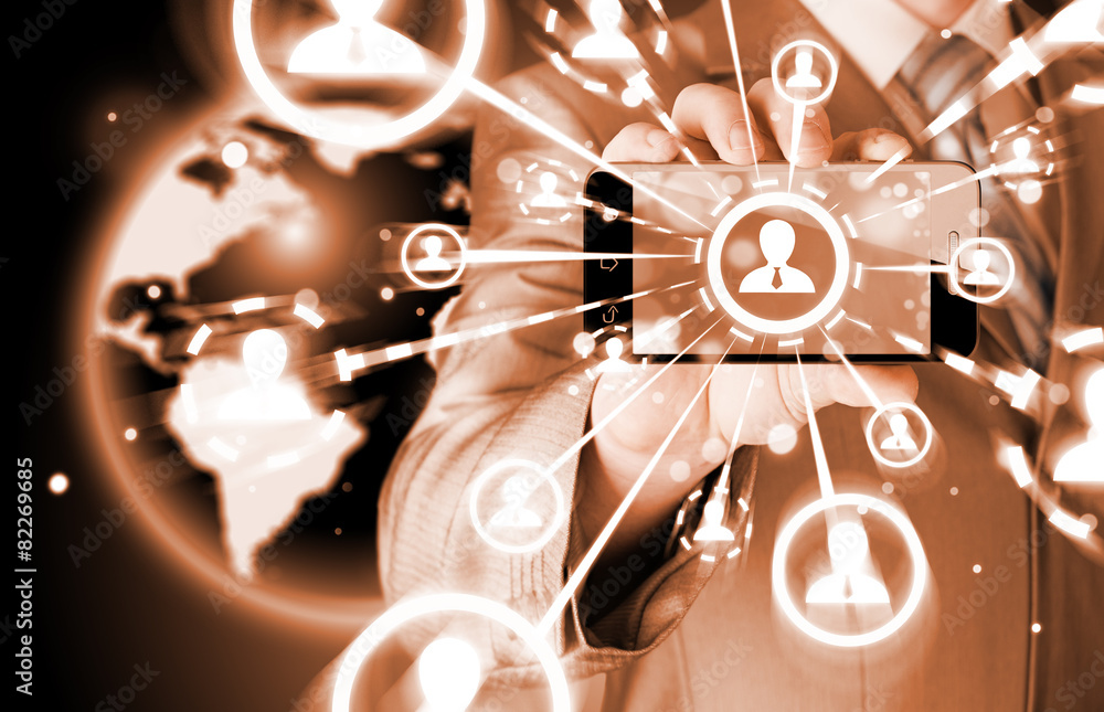 Fototapeta premium Business Hand holding a phone show the social network