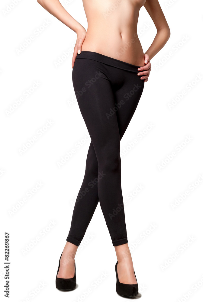 Beautiful girl in black tights and shoes. Isolated Beautiful girl in black tights and shoes. Isolated