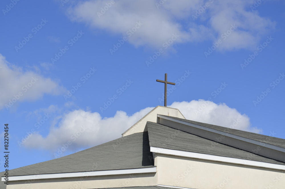 Modern Church roof and steeple with symbolic cross Modern Church roof and steeple with symbolic cross