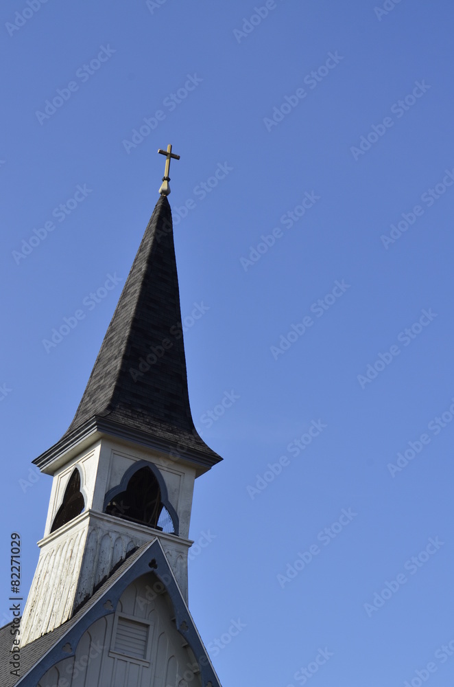Old and weathered church steeple and belfry