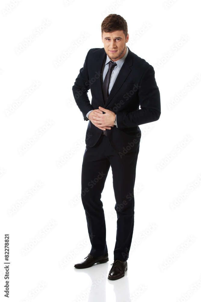 Businessman suffering from stomach pain. Businessman suffering from stomach pain.