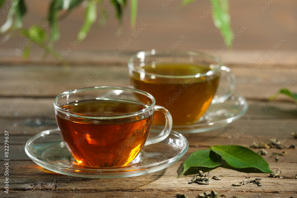 Cups of green tea on table close-up Cups of green tea on table close-up