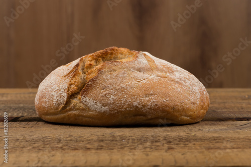 white bread over wooden background