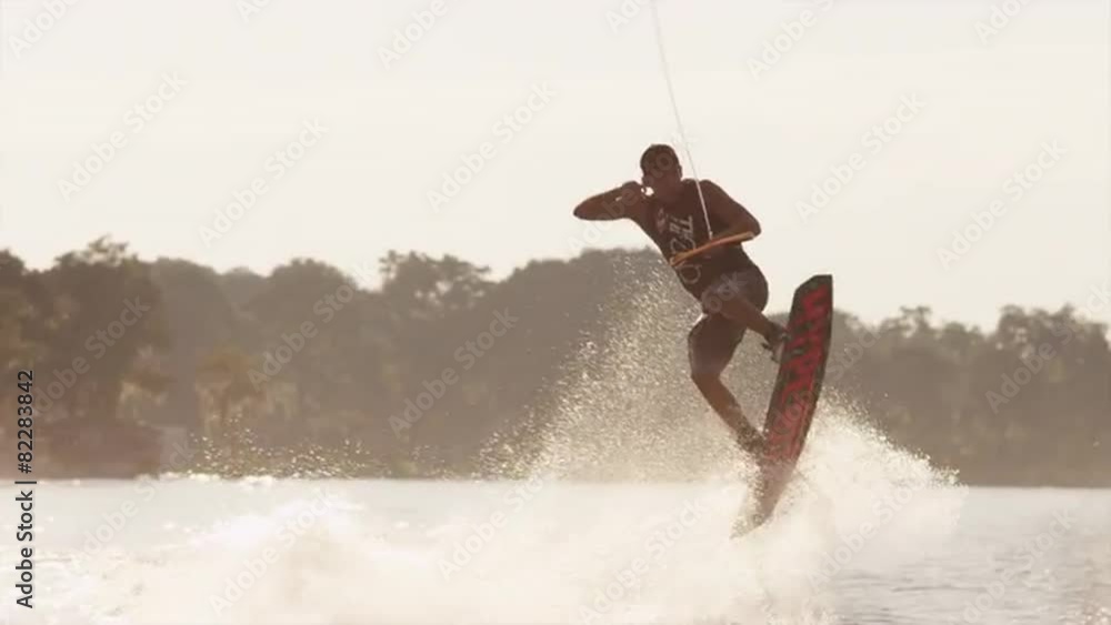 USA, Florida, Orlando, Maitland Lake. Young man on wakeboard Stock