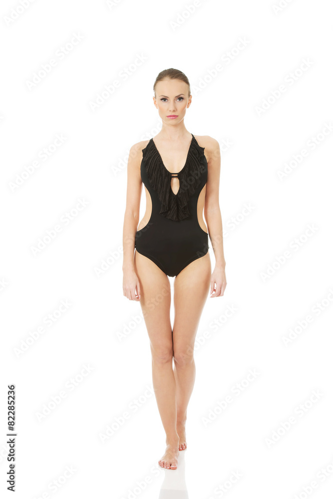 Happy young woman in swimsuit. Happy young woman in swimsuit.