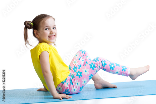 child doing fitness exercises