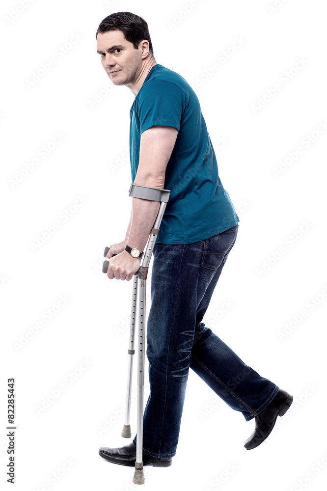 Injured man with crutches.