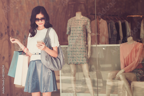 Girl at the shop window