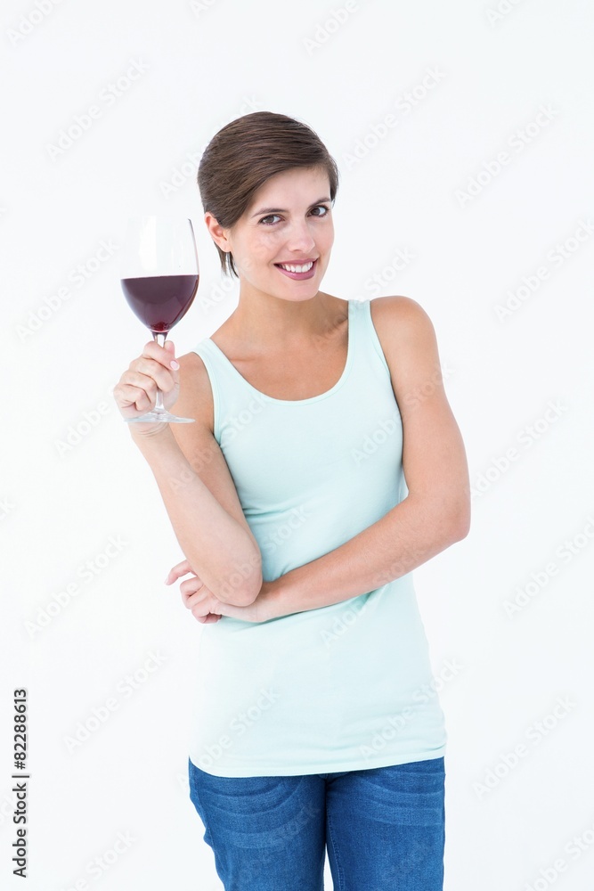Beautiful woman holding glass of red wine Beautiful woman holding glass of red wine