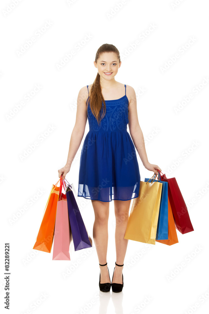 Young woman with shopping bags.