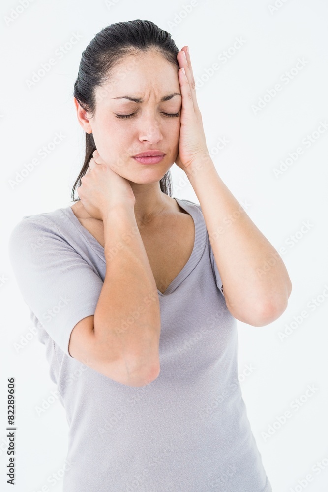Brunette suffering from migraine Brunette suffering from migraine