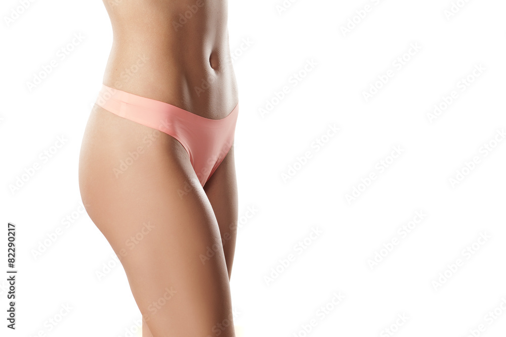 naked woman belly and pink panties on a white background Stock
