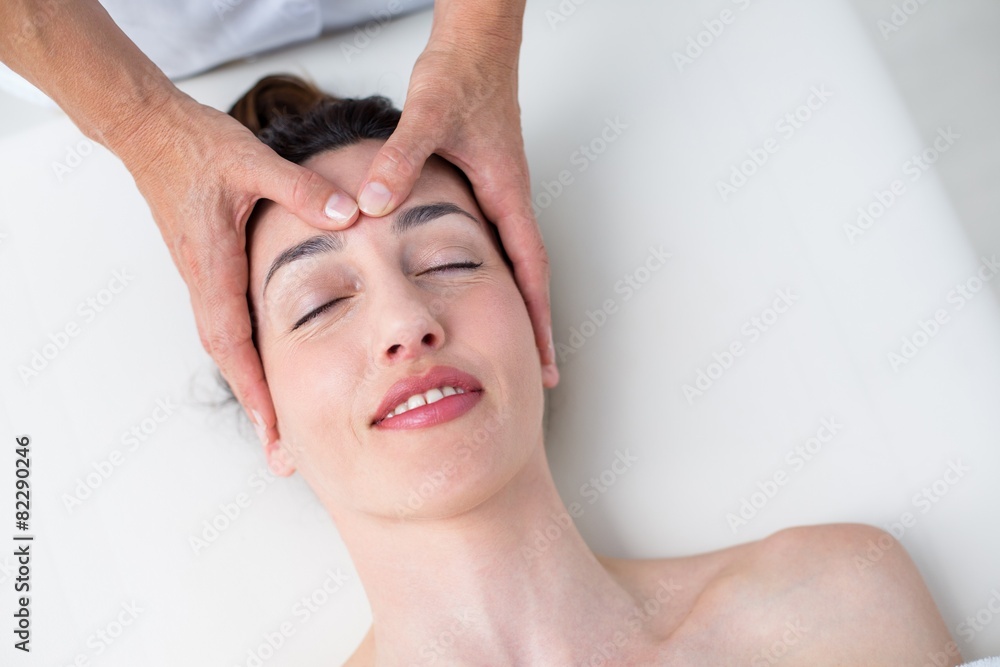 Naklejka premium Physiotherapist doing head massage