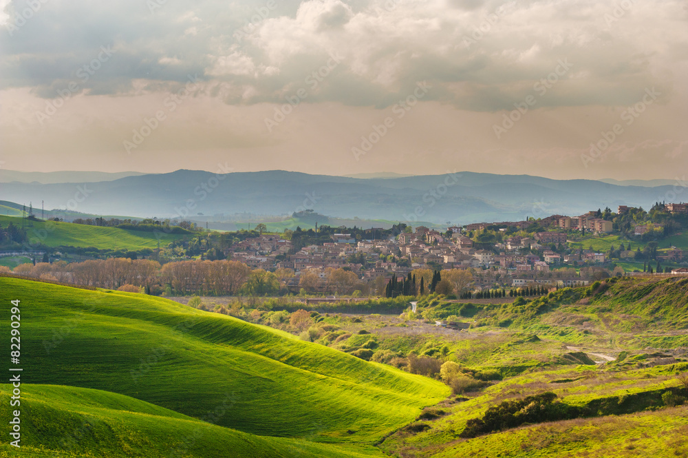 Tuscan spring countryside and the city of Torrenieri