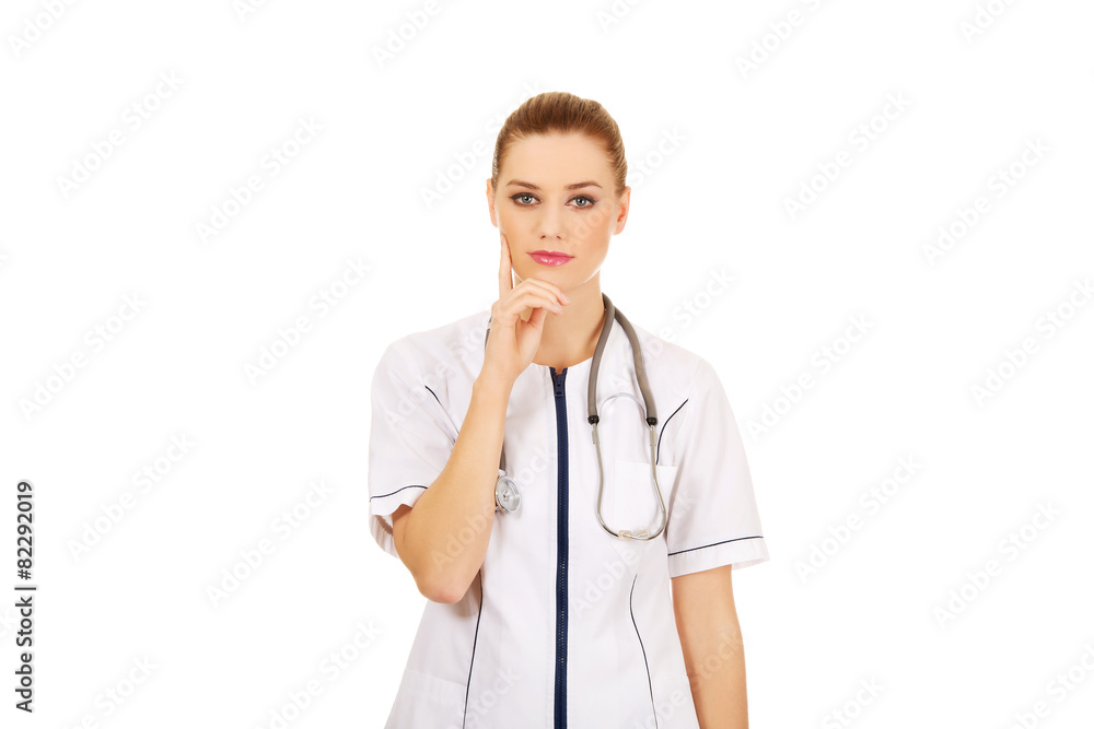 Thoughtful female doctor.