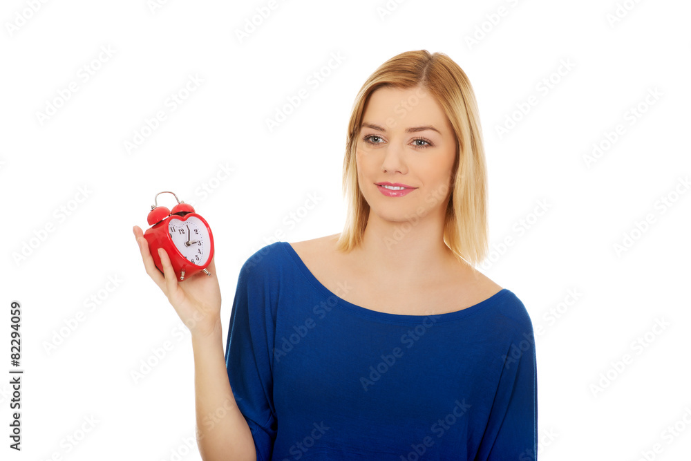 Woman with a clock. Woman with a clock.