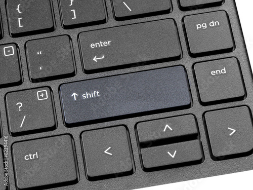 Fotografie computer keyboard with highlighted shift key