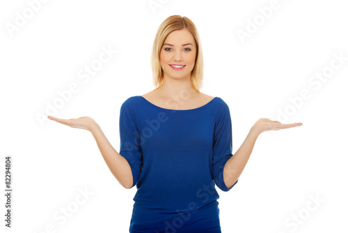 Wallpaper Mural Young woman with empty hands. Torontodigital.ca