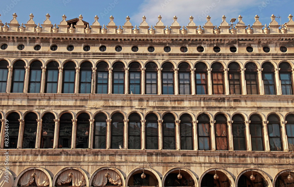 facade with arch windows on Piazza San Marco, Venice