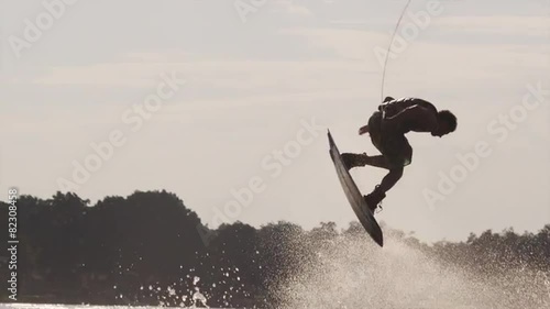 USA, Florida, Orlando, Maitland Lake. Young man on wakeboard