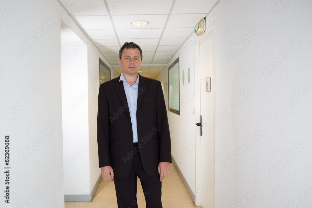 Businessman in his office waiting for his customer Businessman in his office waiting for his customer