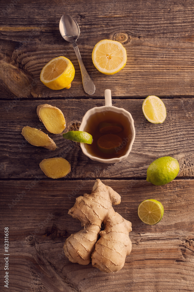 Ginger tea with lime in a white cup