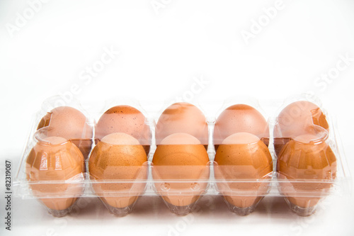 carton of fresh free range eggs on a white background.