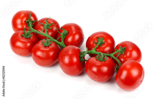 Closeup of tomatoes on the vine isolated on white © Kunz Husum