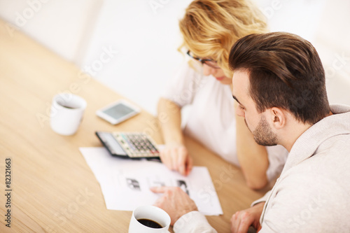 Adult couple working on documents