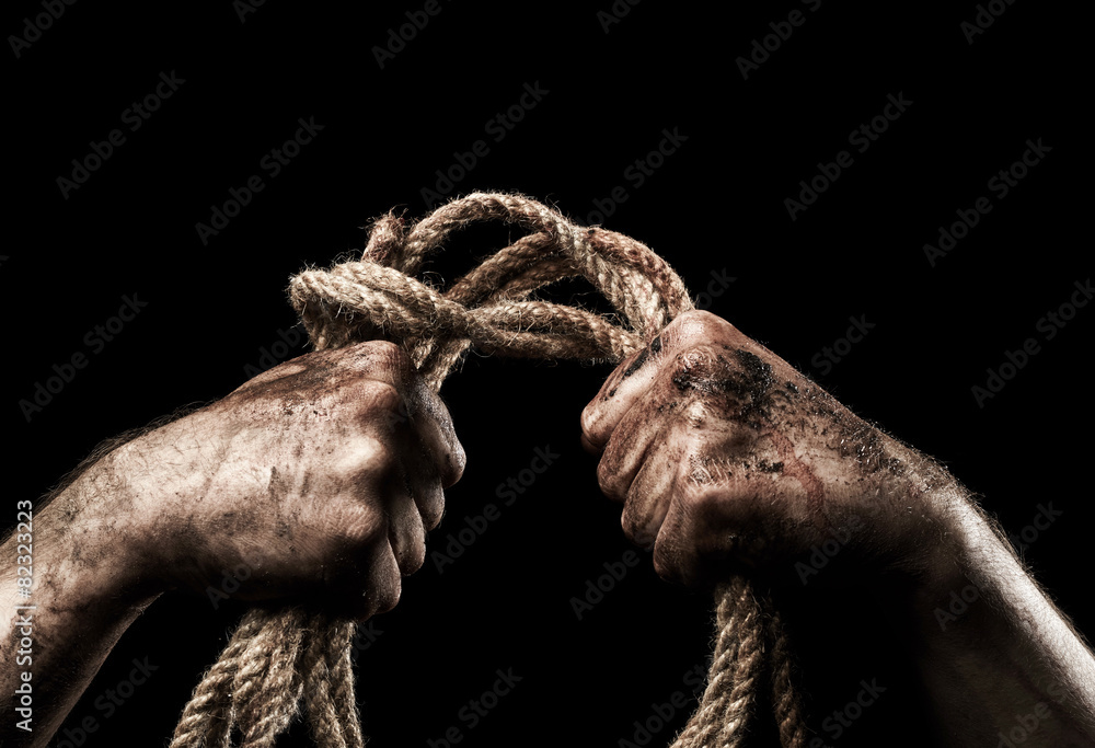 Male hand with rope. Conception aggression