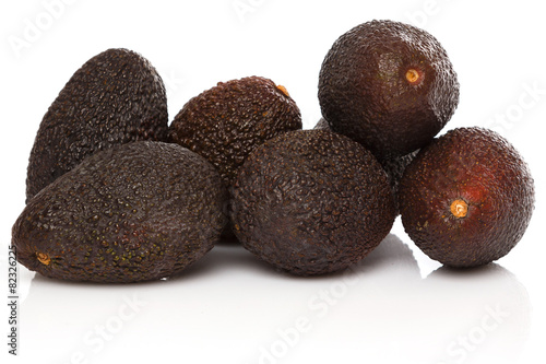 Pile of small avocados