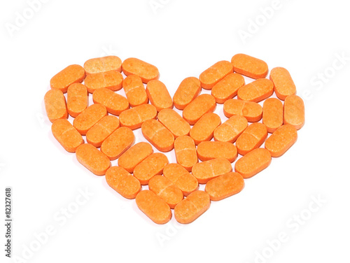 Pills of vitamin C on white background photo