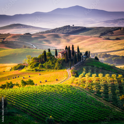 Tuscany, landscape and farmhouse in the hills of Val d'Orcia photo