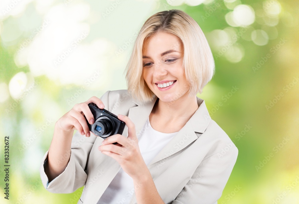 Photo. Happy Young Woman Holding Digital Camera And Taking Photo. Happy Young Woman Holding Digital Camera And Taking
