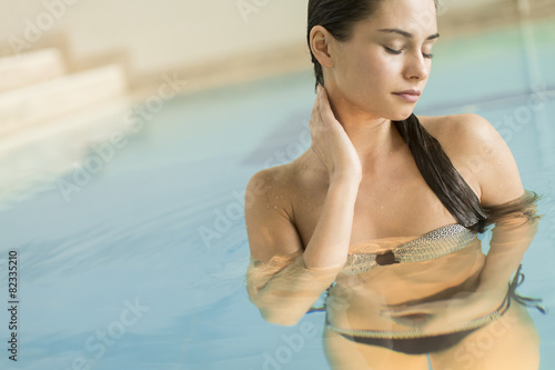 Young woman in the pool