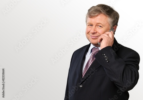 Telephone. Businessman talking on cellphone