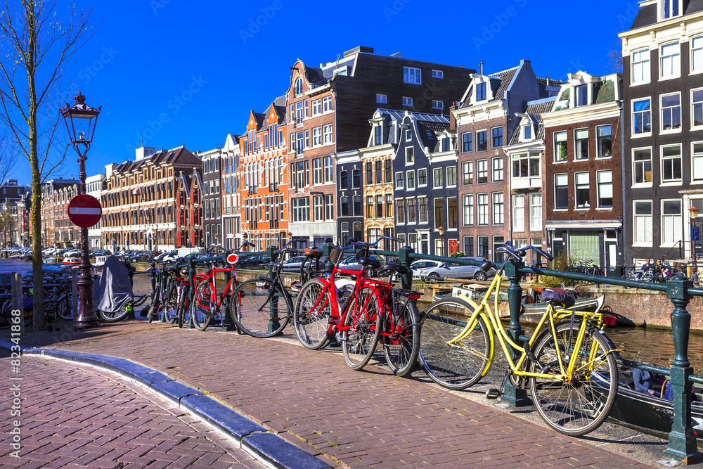 Naklejka premium charming Amsterdam. canals and bikes