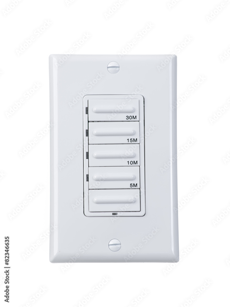 Electrical timer switch isolated on wall Electrical timer switch isolated on wall