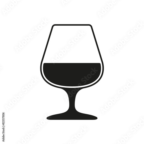 The glass with brandy icon. Brandy symbol. Flat