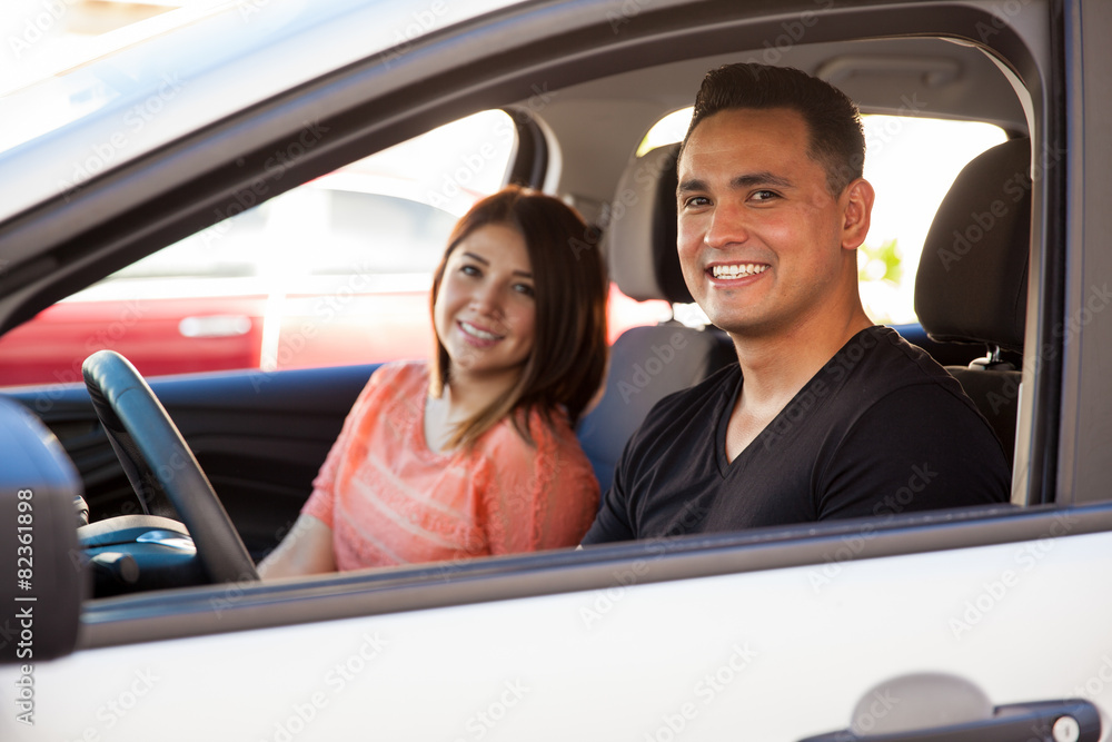 Happy couple in a car Happy couple in a car