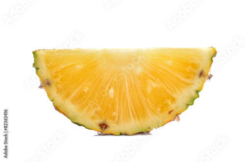 Slice of pineapple isolated on white