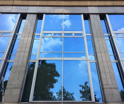reflect sky on glass building