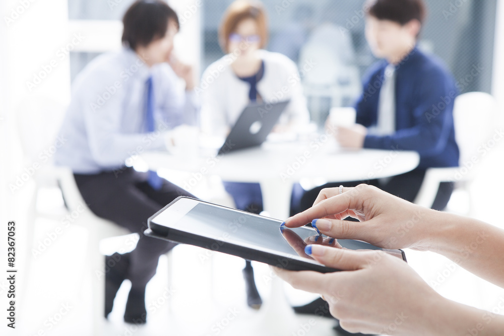 The hands of women who are using electronic tablet The hands of women who are using electronic tablet