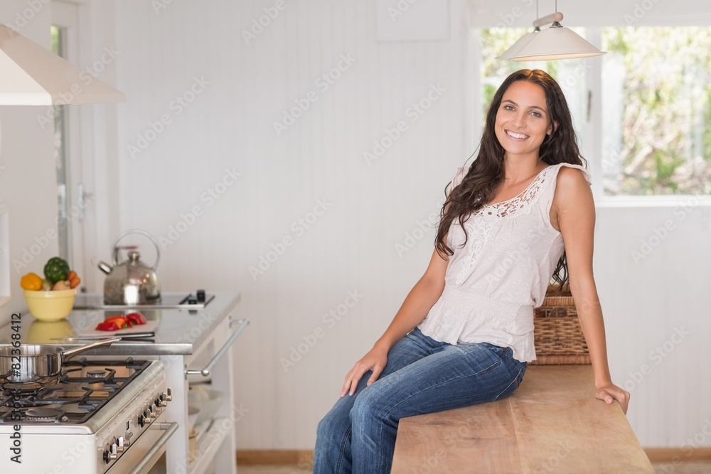 Beautiful brunette smiling at camera Beautiful brunette smiling at camera