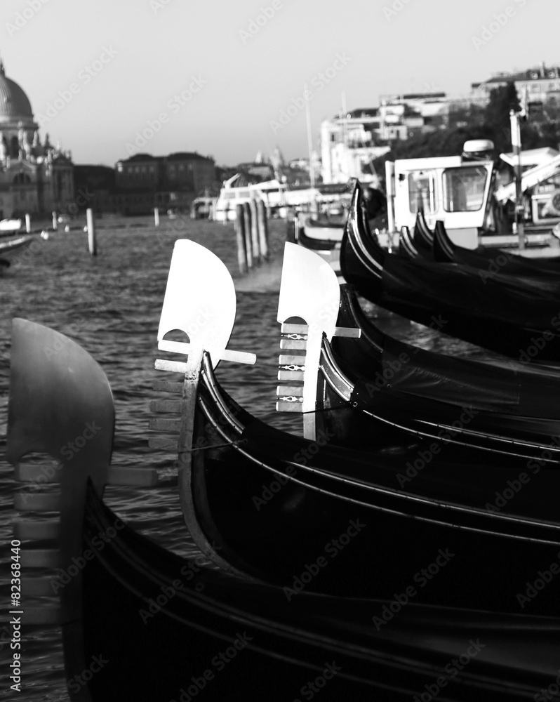 gondolas in Venice in Italy during high tide